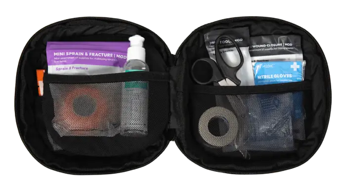 Inside of a small first aid kit. 