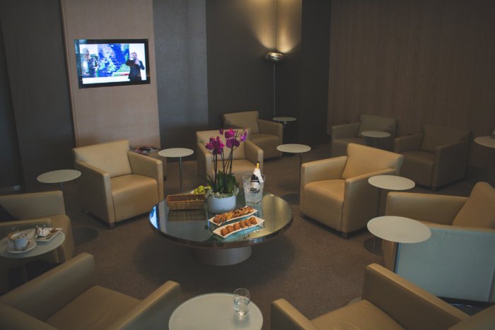 An upscale airport business class lounge.